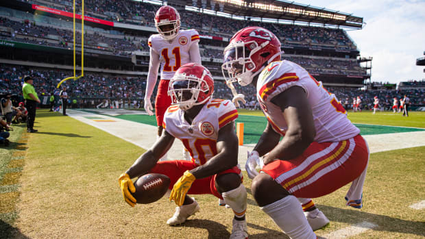 Oct 3, 2021; Philadelphia, Pennsylvania, USA; Kansas City Chiefs wide receiver Tyreek Hill (10) reacts with wide receiver Demarcus Robinson (11) and running back Darrel Williams (31) after his touchdown catch against the Philadelphia Eagles during the fourth quarter at Lincoln Financial Field. Mandatory Credit: Bill Streicher-USA TODAY Sports